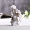 Фигурка полистоун «Ангелочек с крестиком из страз», 8×6.5×4 см